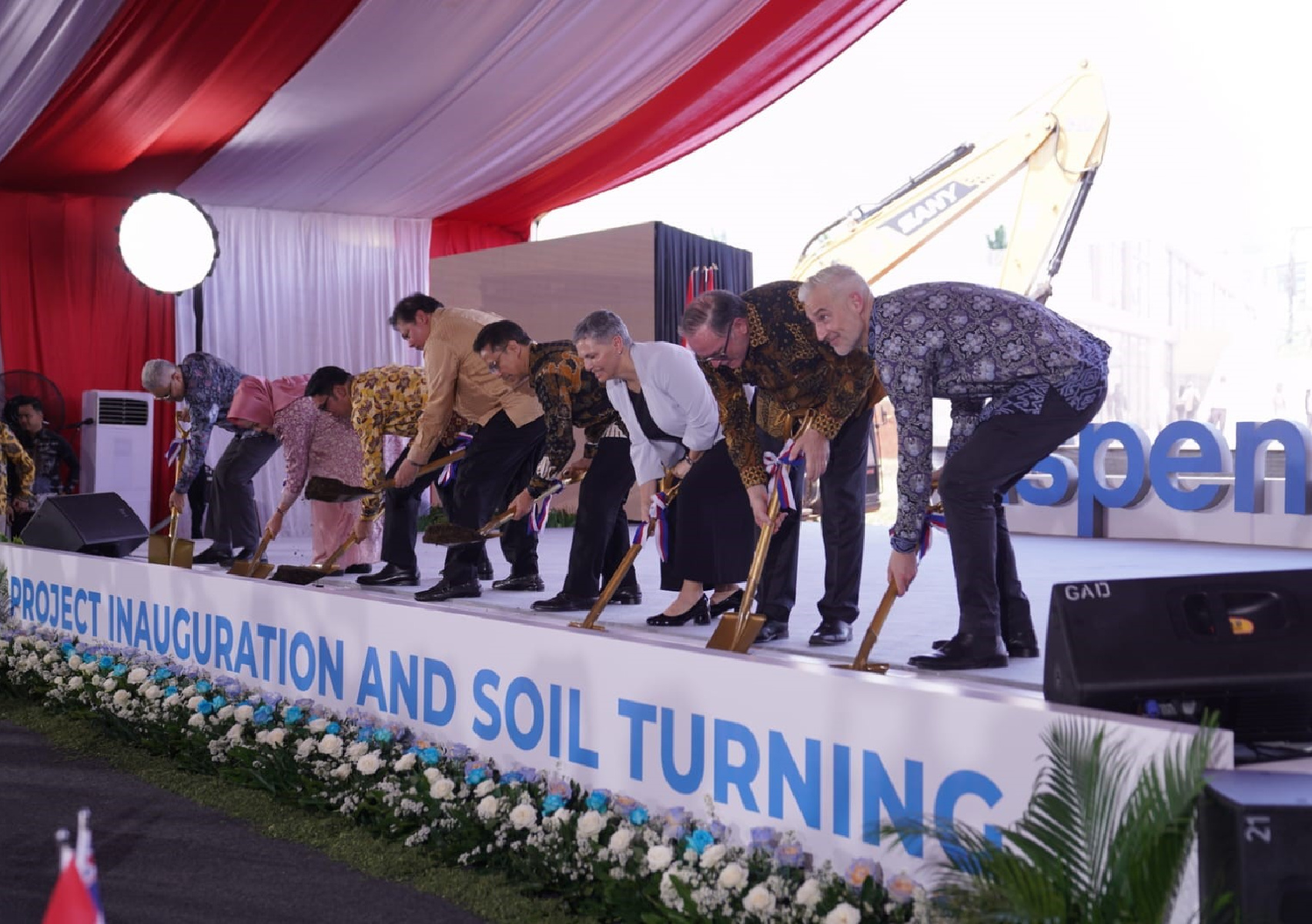 VIPs and dignitaries turning soil at the inauguration ceremony in Depok, West Java.
